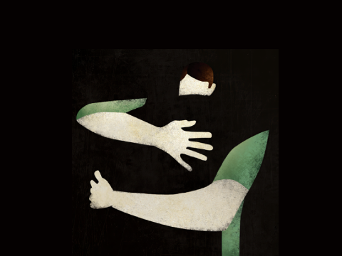 Twee mensen verstrengeld in een knuffel.