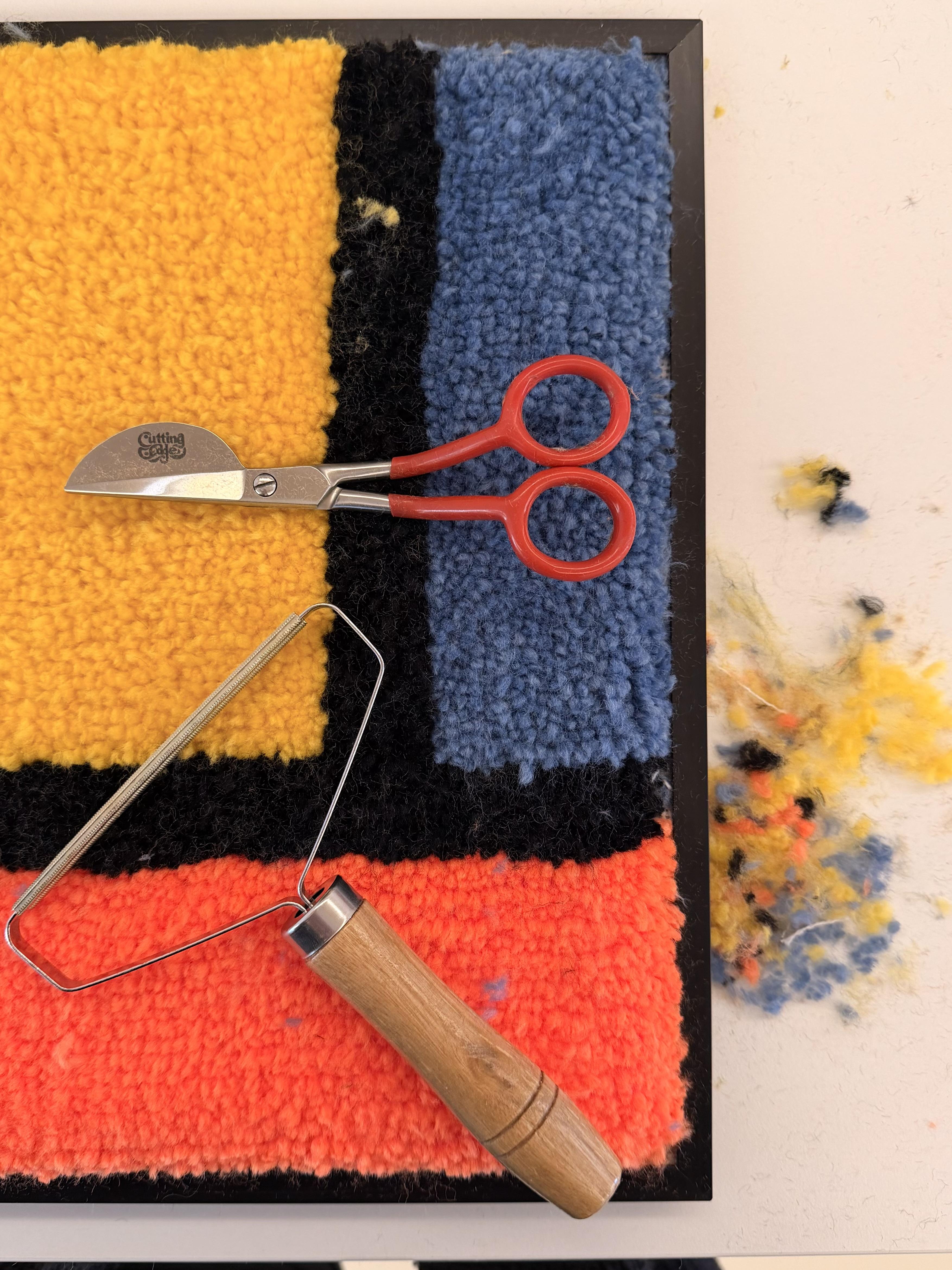kleurrijke vlakken wol schaar schraper
