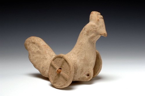 Haantje op wielen in terracotta