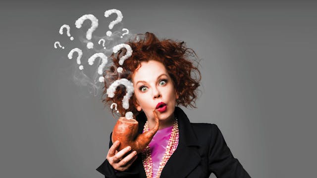 Els De Schepper rookt een pijp waar vraagtekens uitkomen