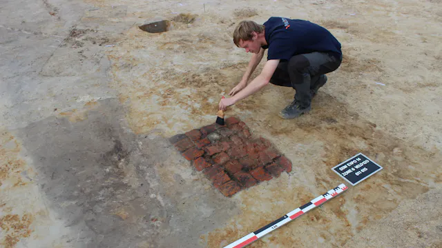 Archeoloog aan het werk op The Loop