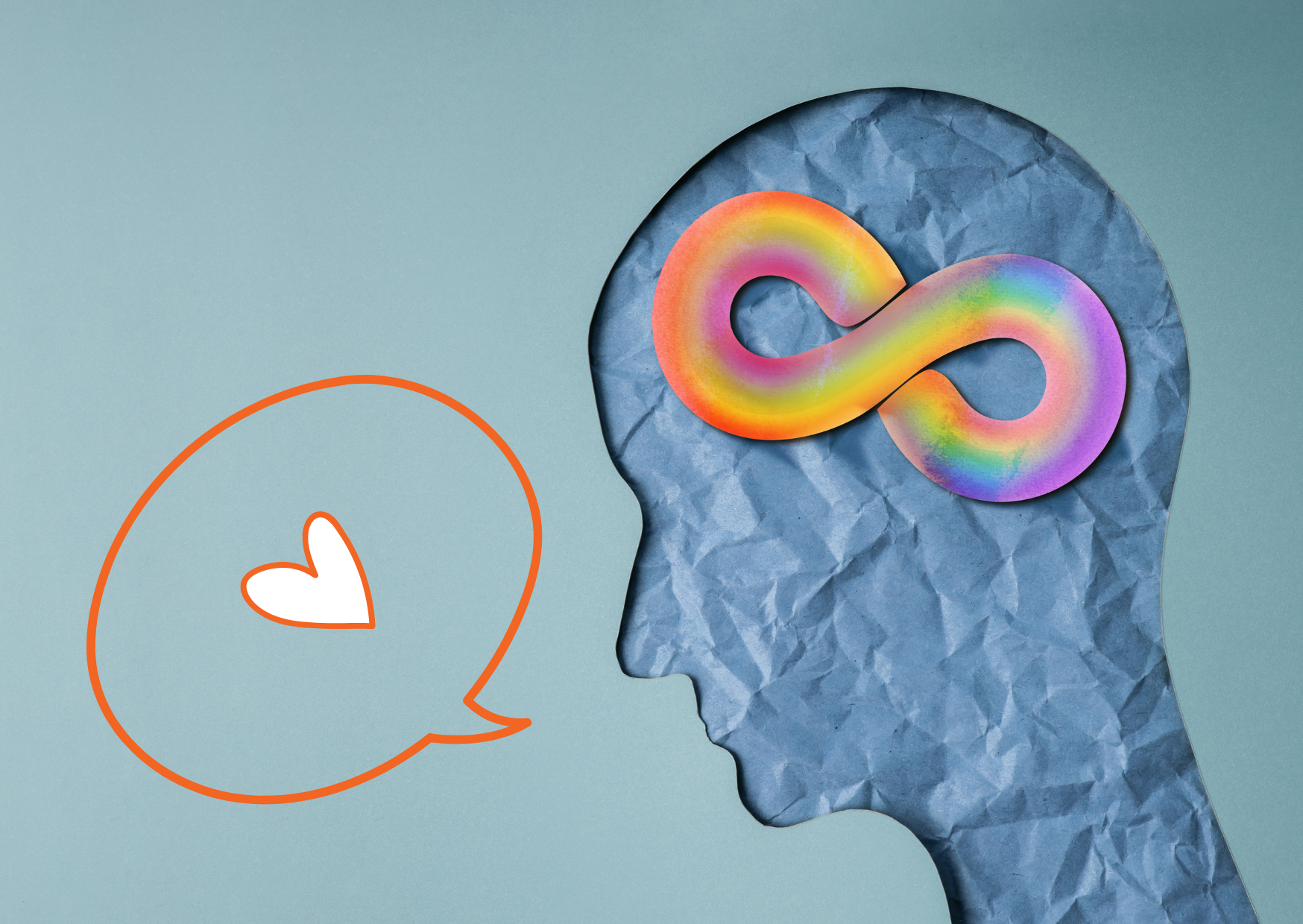 hoofd uit krantenpapier met gekleurd oneindigheidsteken