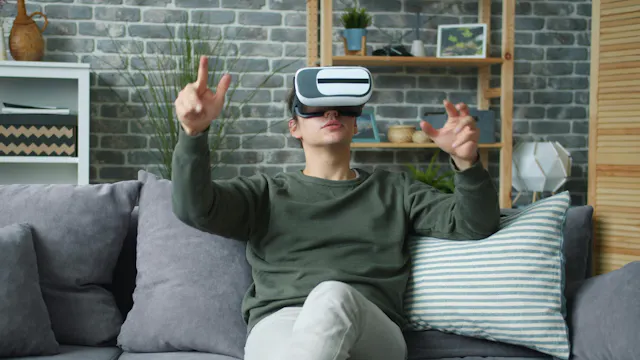 man met VR bril in zetel