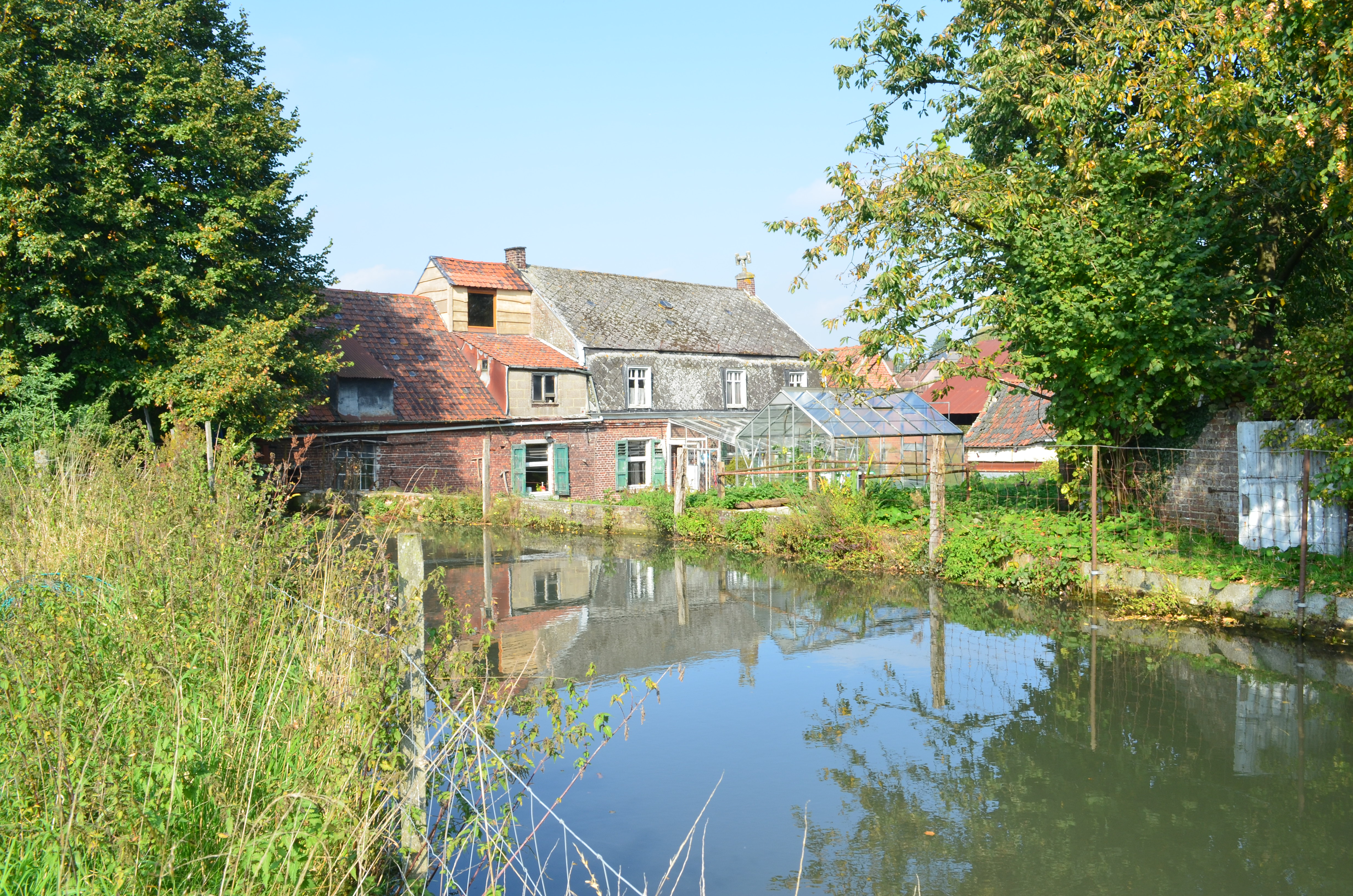 Zicht op de Traveinsbeek en de watermolen