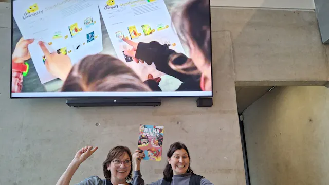 Bibmedewerkers met boeken en voorleescinema