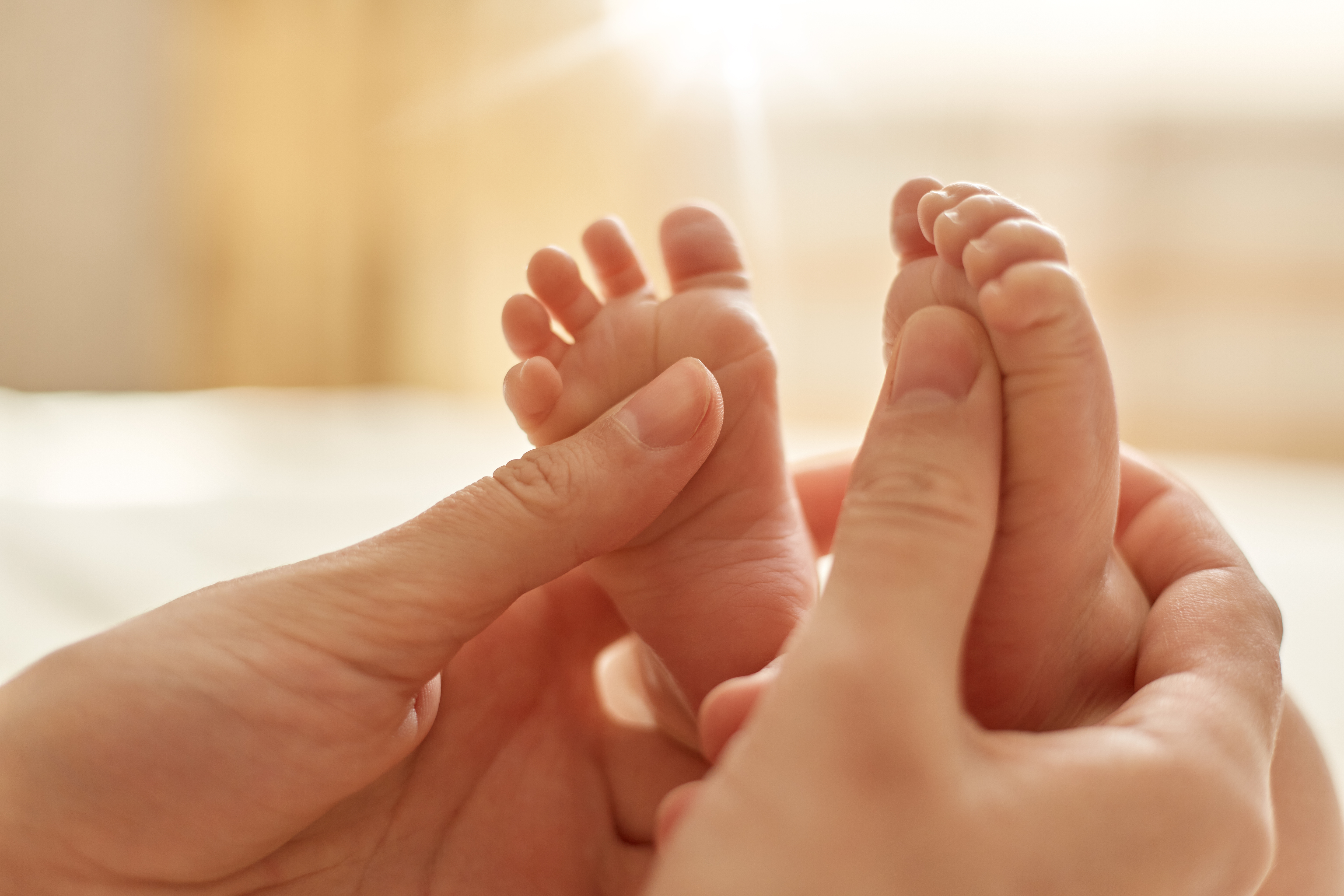 massage baby feet