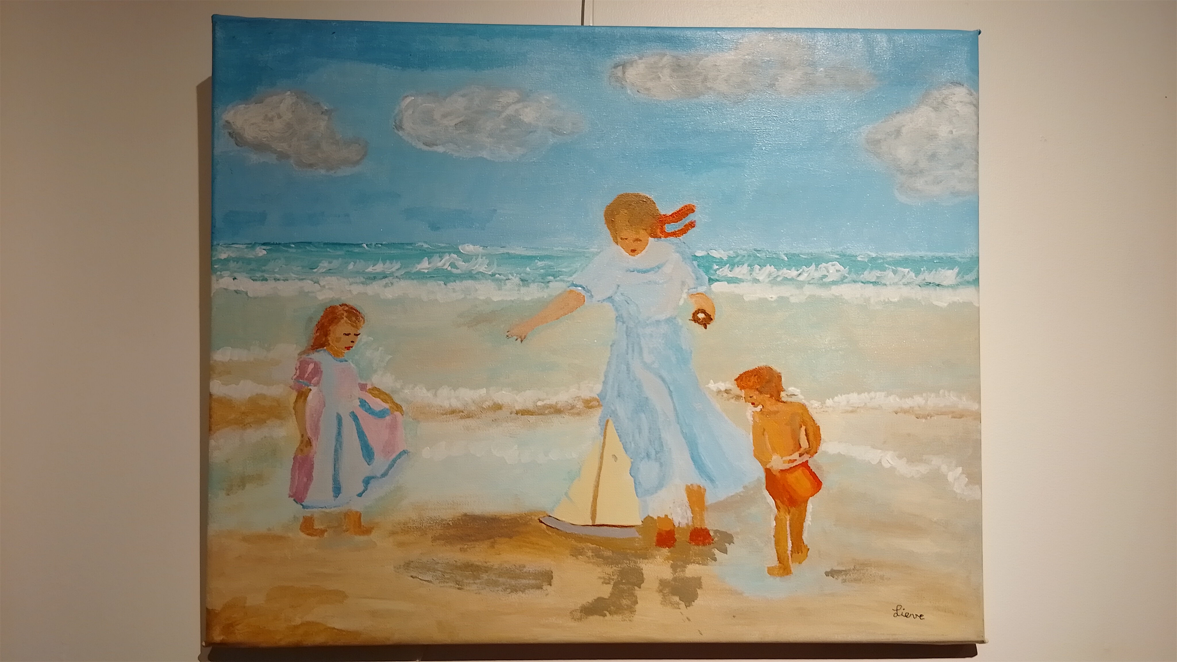 moeder en kinderen aan zee