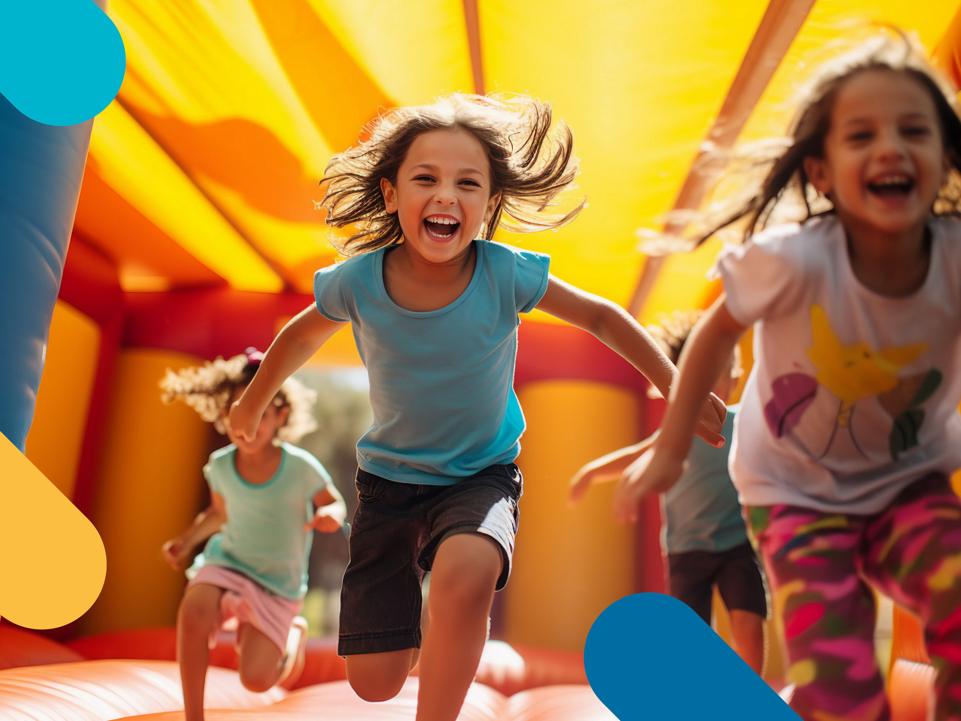 children jumping in bounce house 